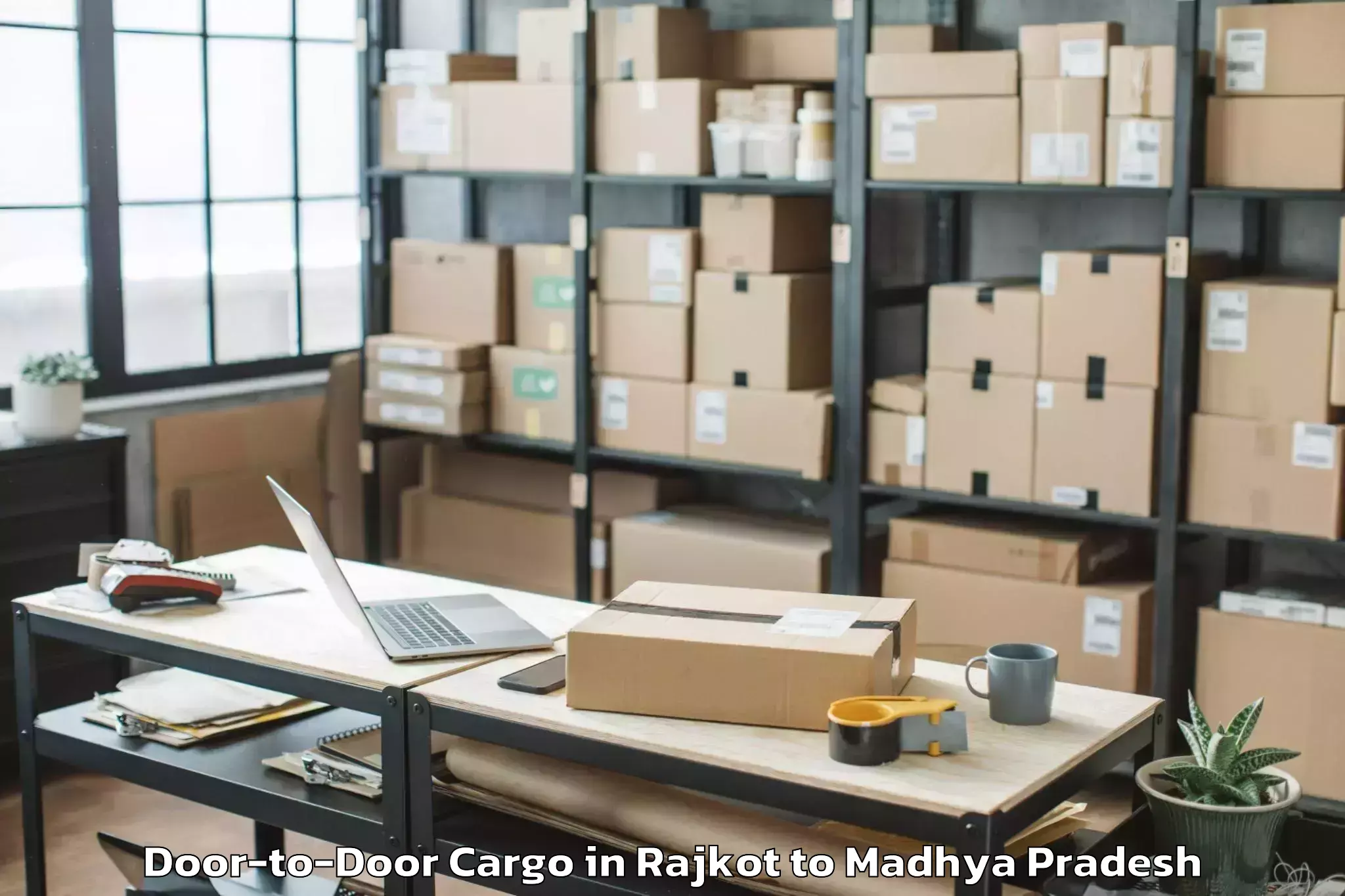 Affordable Rajkot to Pichhore Door To Door Cargo